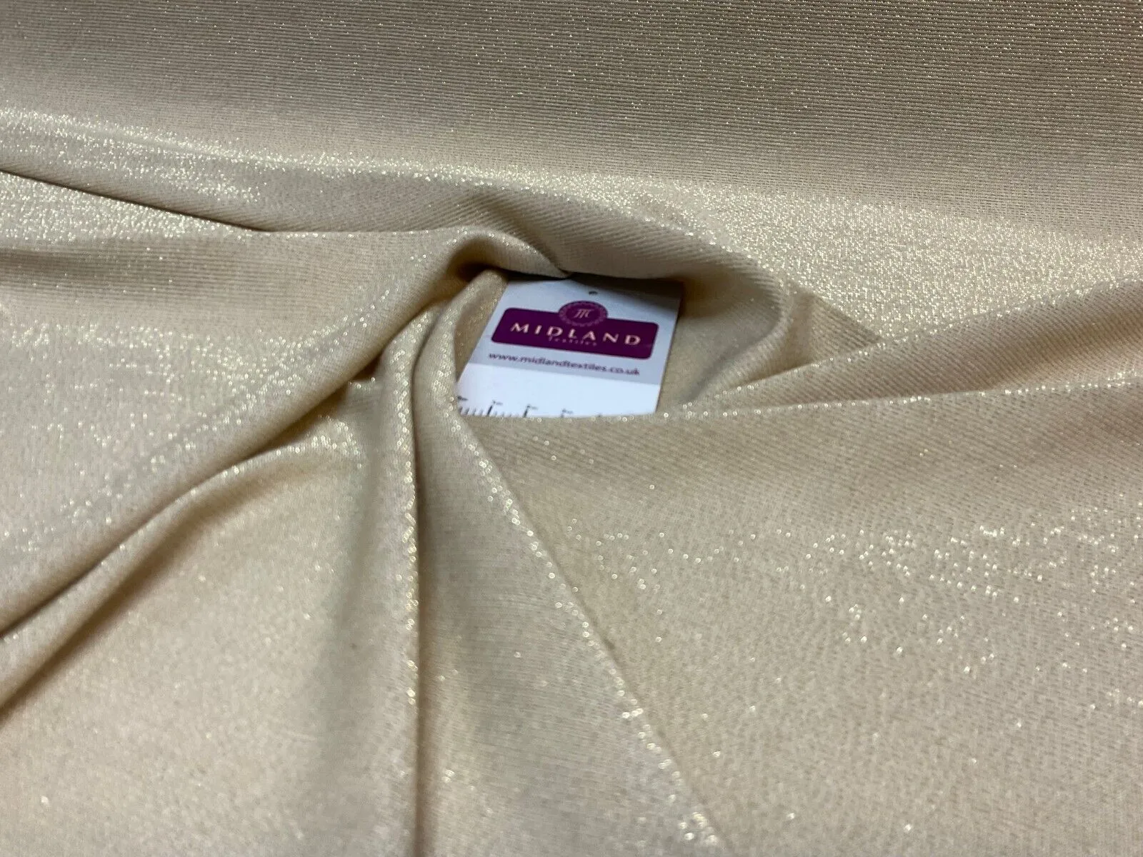 Gold Jersey Stretch Shimmer Metalic dress fabric M1783