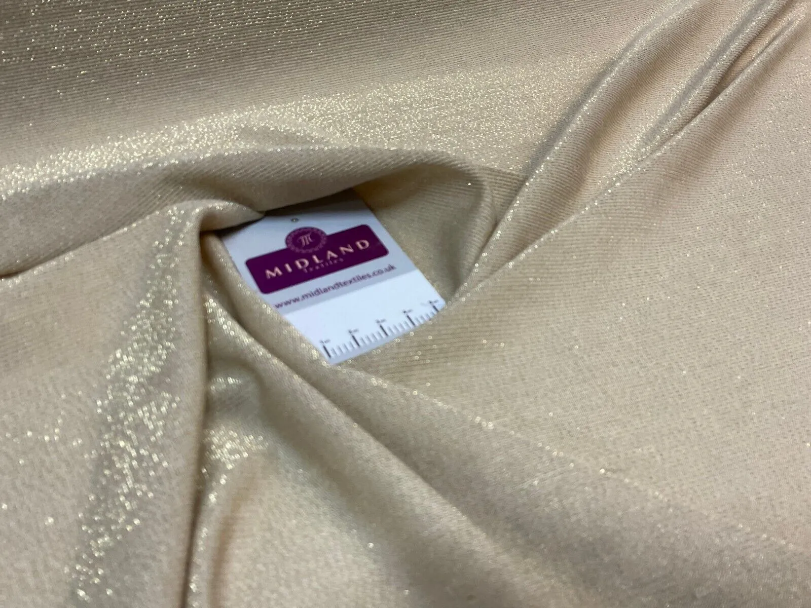 Gold Jersey Stretch Shimmer Metalic dress fabric M1783